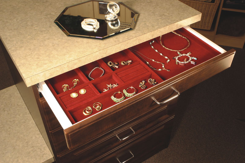 Closet drawers in closets can include jewelty trays